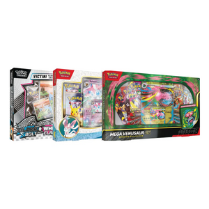 Three Pokémon Trading Card Game boxes are displayed side by side, featuring Victini, Sylveon, and Mega Venusaur EX packs, with colorful packaging and visible cards inside each box.