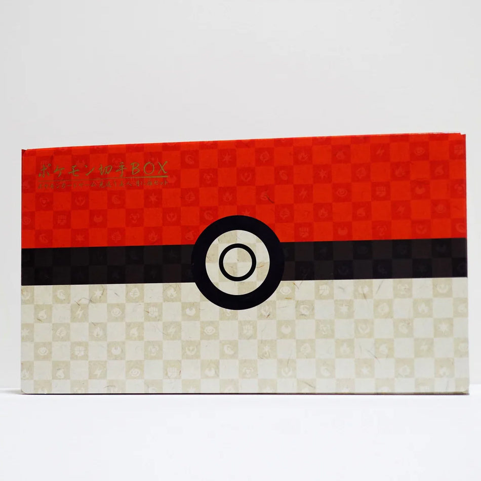 A rectangular 2021 Pokémon Japanese Post Stamp Box by The Pokémon Company, with a red top, beige bottom, black Poké Ball stripe, and Japanese text in the corner. Part of the Japan Post Special Box samlersæt.