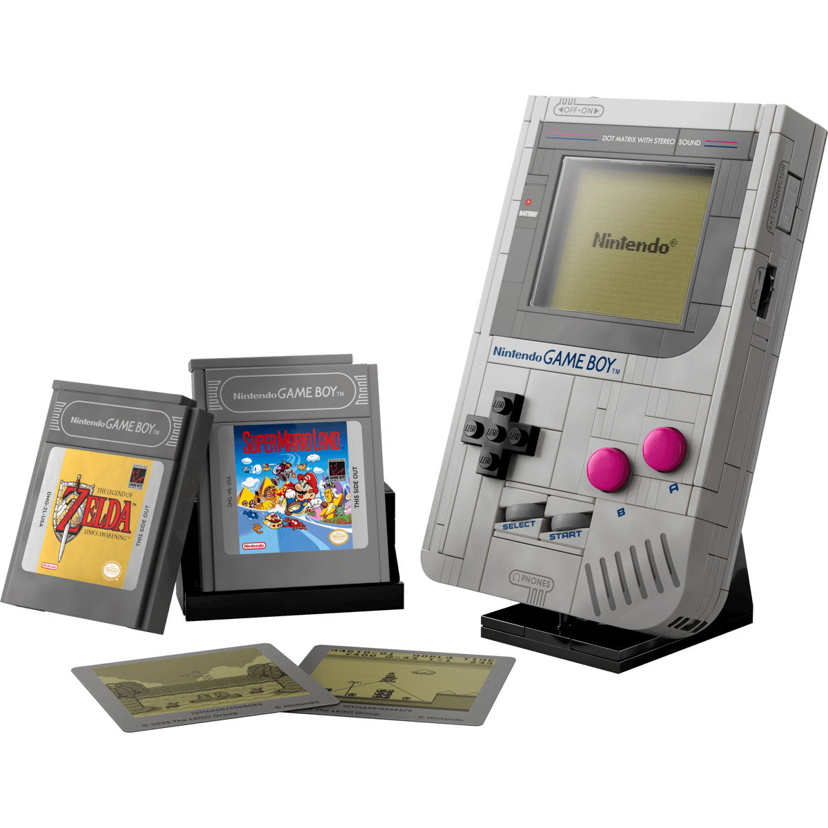The LEGO Super Mario™ Game Boy™ by LEGO captures retro gaming vibes with two cartridge stands for The Legend of Zelda and Super Mario Land, plus two pixelated game scene tiles displayed in front.