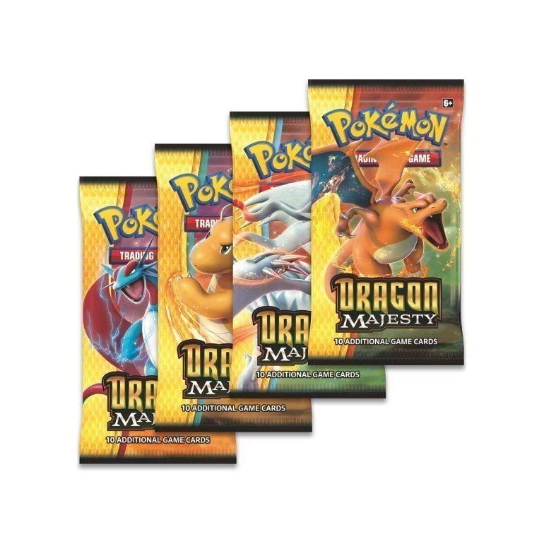 Four Pokémon - Dragon Majesty Booster Pack cards arranged in a fan, each featuring different dragon-like creatures on the packaging.
