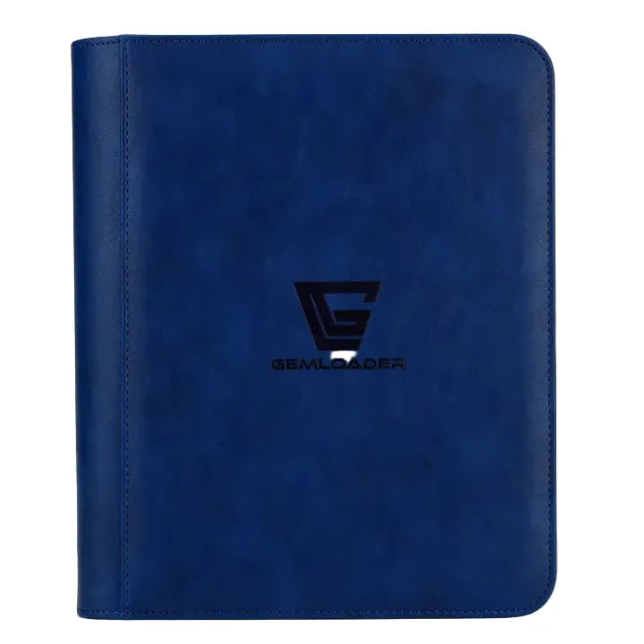 The Gemloader: Premium Toploader Mappe [112 pockets 2X2] by Gemloader is a blue leather binder with rounded edges, displaying a black G logo and the word GEMLOADER on the front cover. Standing upright against a plain background, this premium collector’s mappe is the ideal tilbehør til samlekort, expertly designed to keep your collection organized and protected.