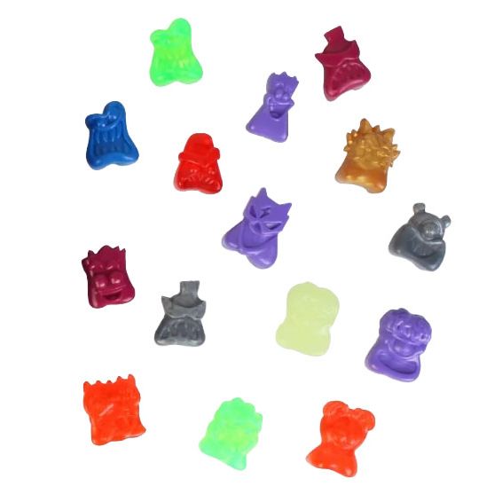 Colorful, translucent, irregularly shaped plastic or gummy pieces from FirstGrade’s First Grade: Jojo’s Tube - Series 1 are arranged on a white background, each featuring unique character-like faces and designs in vibrant shades of red, purple, green, orange, blue, and gray—perfect for displaying as playful jojo accessories or storing in your favorite Jojo tube or Jojo opbevaring.